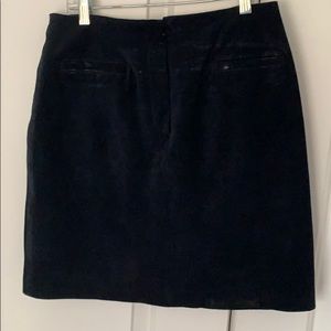 Blue suede mini skirt